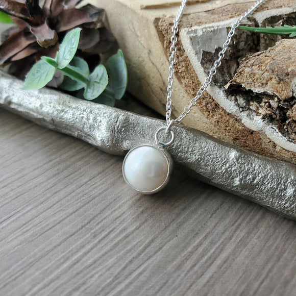 Pearl Necklace, Button